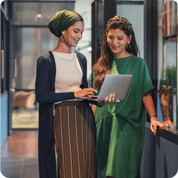 Two women with laptop